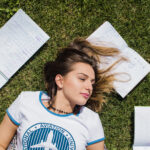 brunette-girl-lying-grass